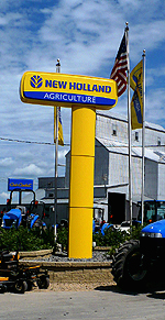 New Holland dealer sign at Werner Implement Company, Inc.